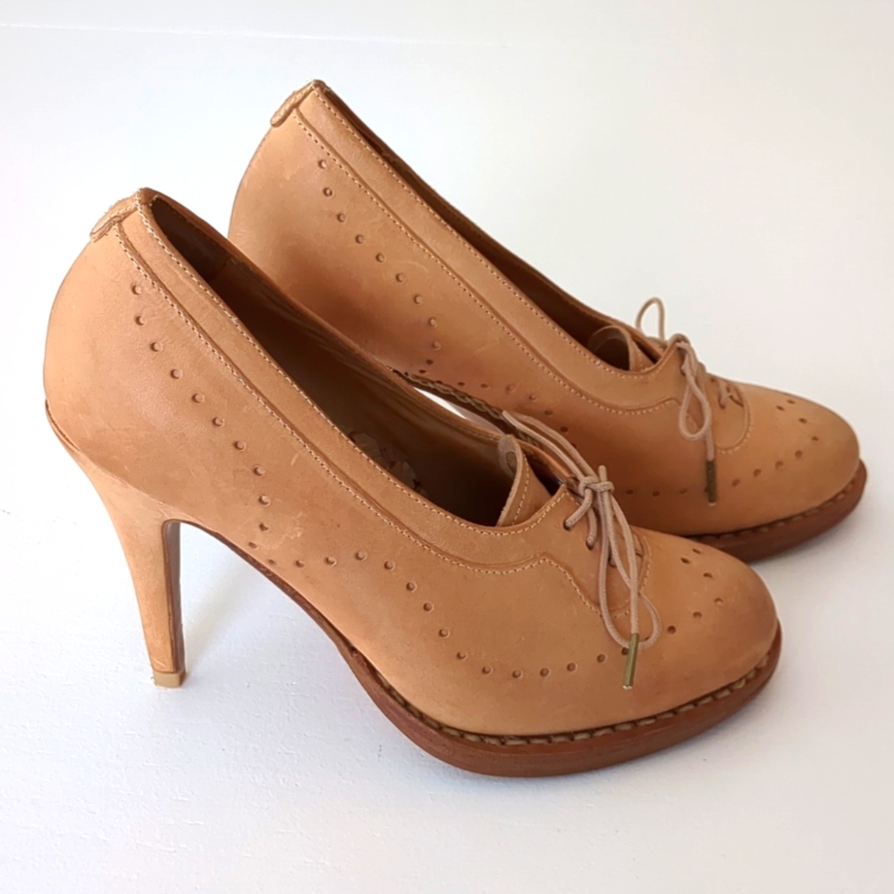 THE OFFICE OF ANGELA SCOTT Heels
